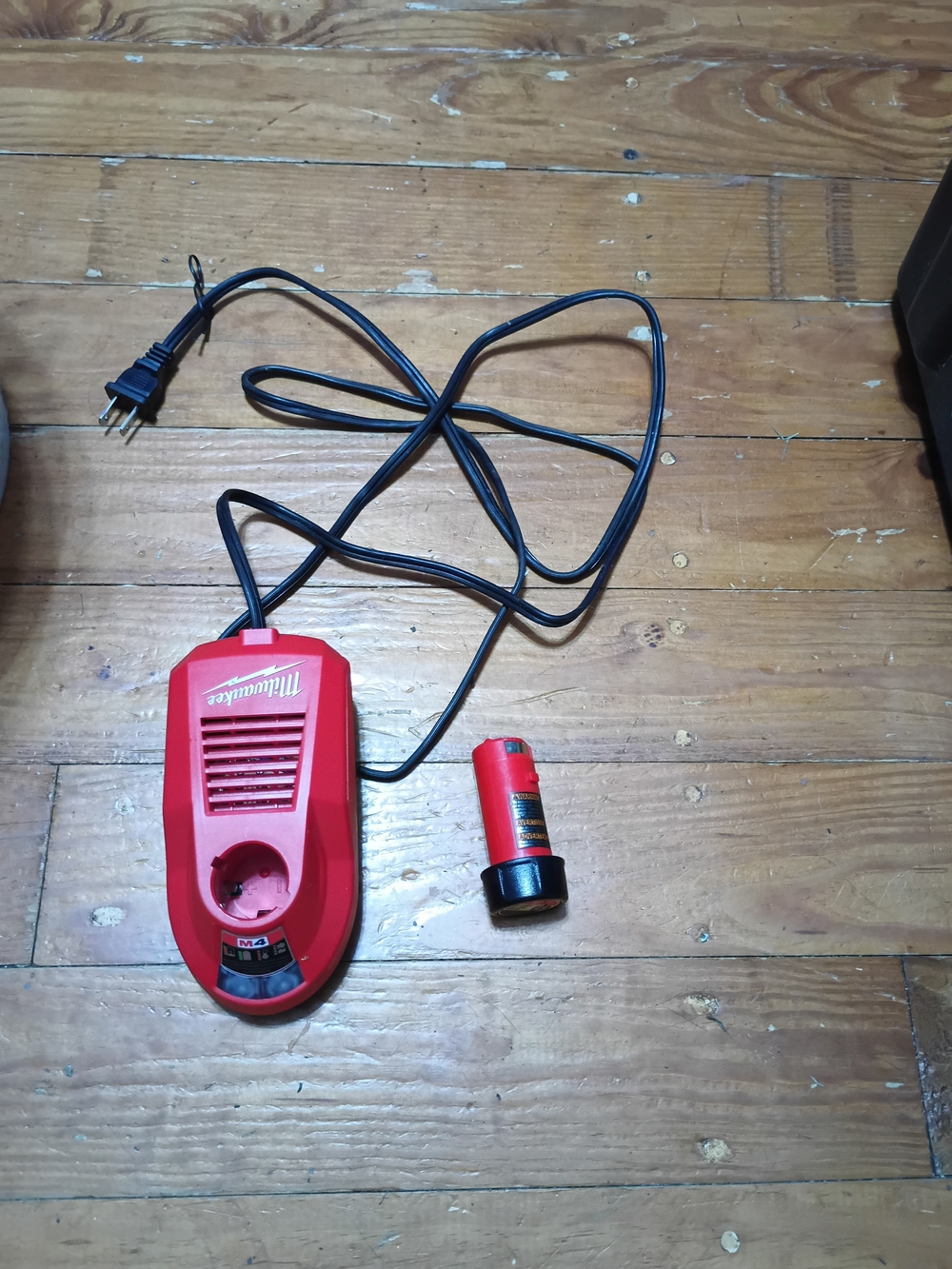 Milwaukee Battery Charger and Battery Pack - Red